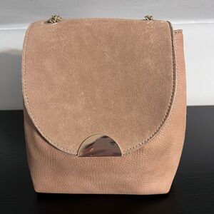 Tab cross body with gold chain cross body strap